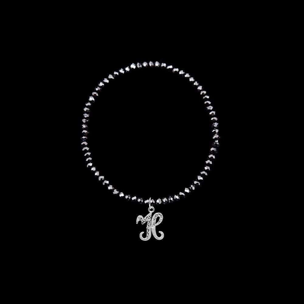 Pulseira Letra H .